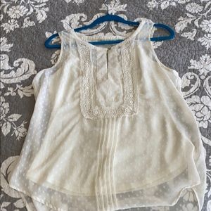 Cream dressy top cute to dress up or with jeans.